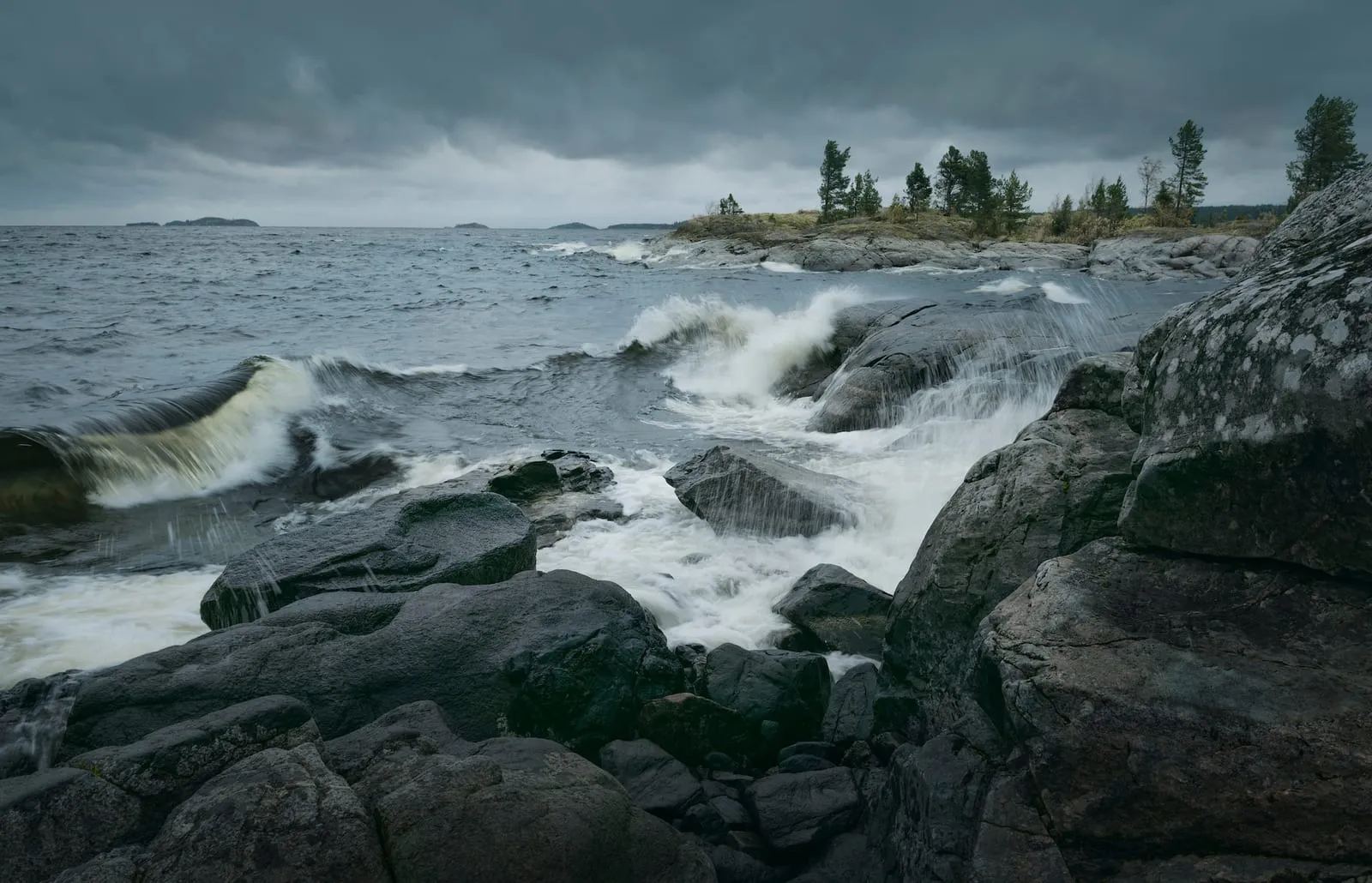 Storm sea breaking against rocks
